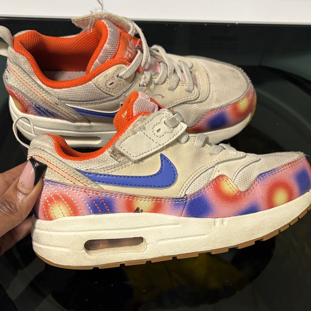 Nike Kids Sneakers with Blue and Orange Design